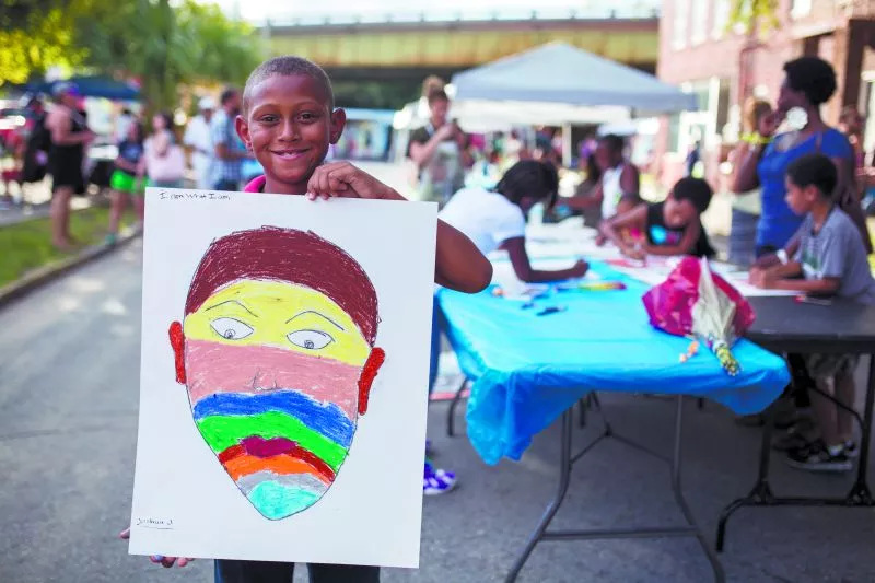 The community block parties are an opportunity to celebrate, make art and continue conversations about community issues. - PHOTO BY JOHN ALEXANDER