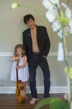 "They love to play music, even though they're not very musical yet," Keith says of the Kozel kids. - GEOFF L. JOHNSON