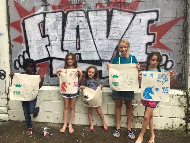 At last year’s camp, kids created during the week and then strutted their stuff on the runway with models who wore their outfits. - PHOTO BY JOSH LYONS
