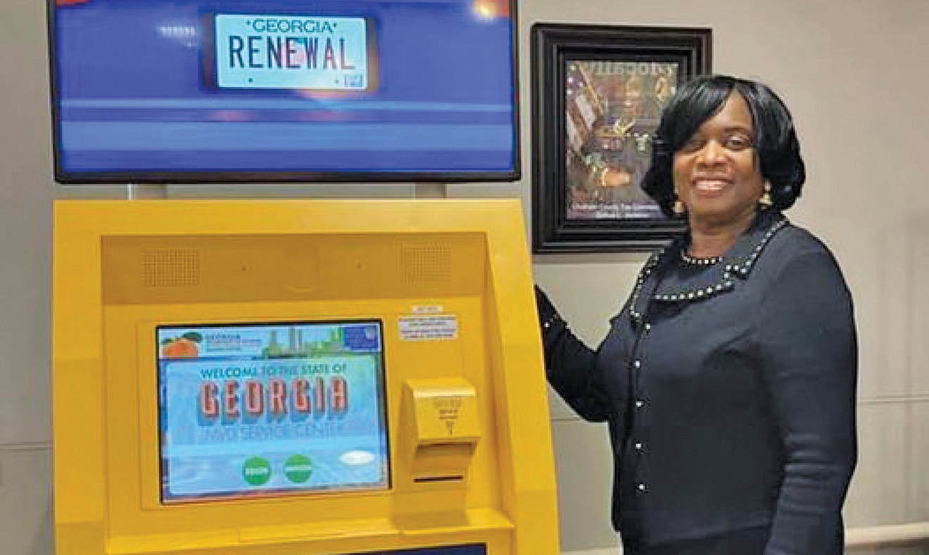 Sonya L. Jackson with the GA Motor Vehicle tag renewal kiosk in the Wilmington Isl. Kroger. Photo from Facebook