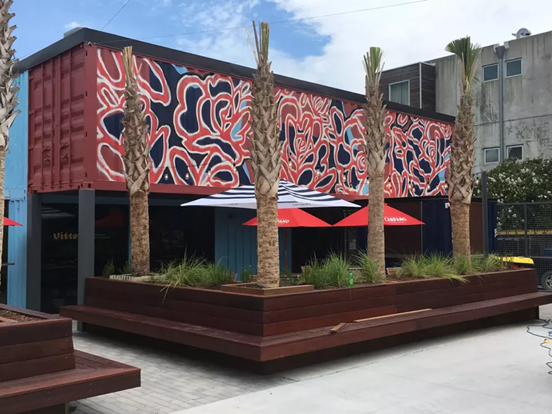 Jimmy Butcher's mural above Vittoria Napoletana. - PHOTO BY JIM MOREKIS