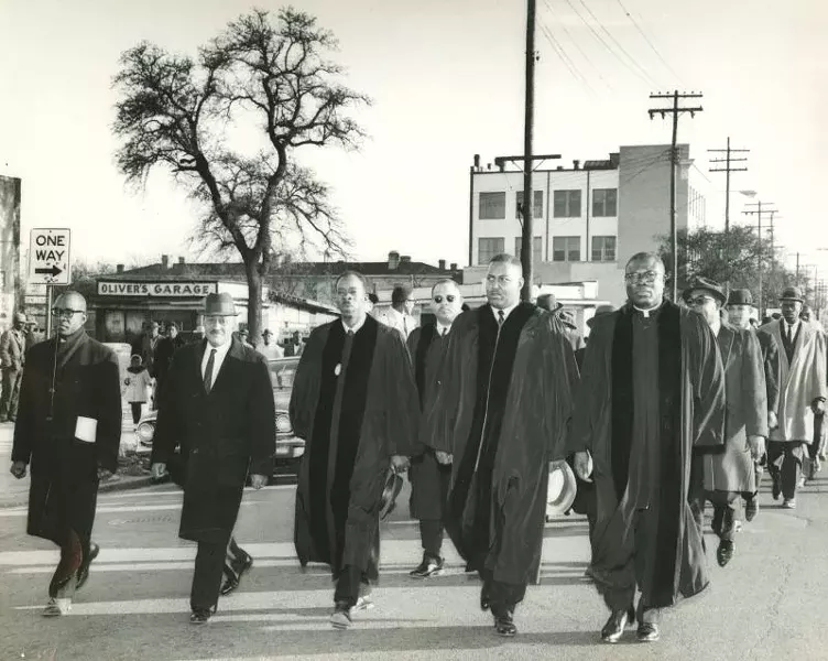 W. W. Law and local pastors lead march in solidarity with Selma to Montgomery marchers down West Broad Street, March 1965. Courtesy of the City of Savannah Municipal Archives.