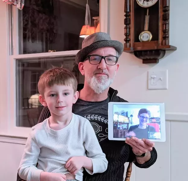 Markus Kuhlmann, Jen Jenkins, and their son