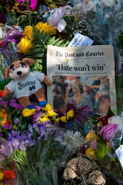 A tribute outside Emanuel AME Church this past weekend. - CAROLYN DIMMICK