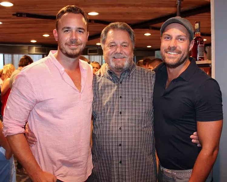 Trey Wilder (right), with partners Bill Wilder (middle), his father, and Rick Kunzi (left), proudly walked around greeting customers, immersing themselves in the bustle of their latest quirky restaurant experiment, Hitch.