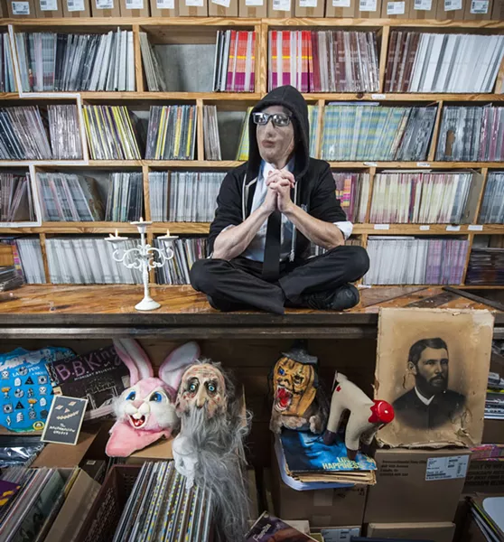 Ryan Graveface among a small selection of his records and curiosities. - PHOTO BY GEOFF L. JOHNSON