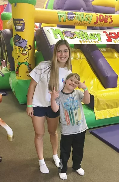 UTime founder Lily Glass clowns around with special friend Ethan Shrek.