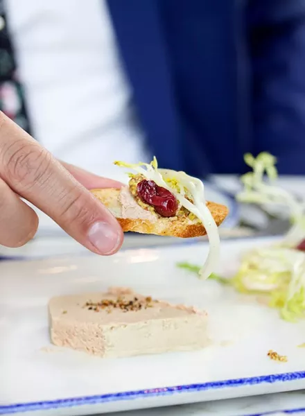 Duck liver mousse served with picked grapes and whole grain mustard