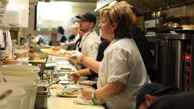 James' mother, Val, working the line at her restaurant.