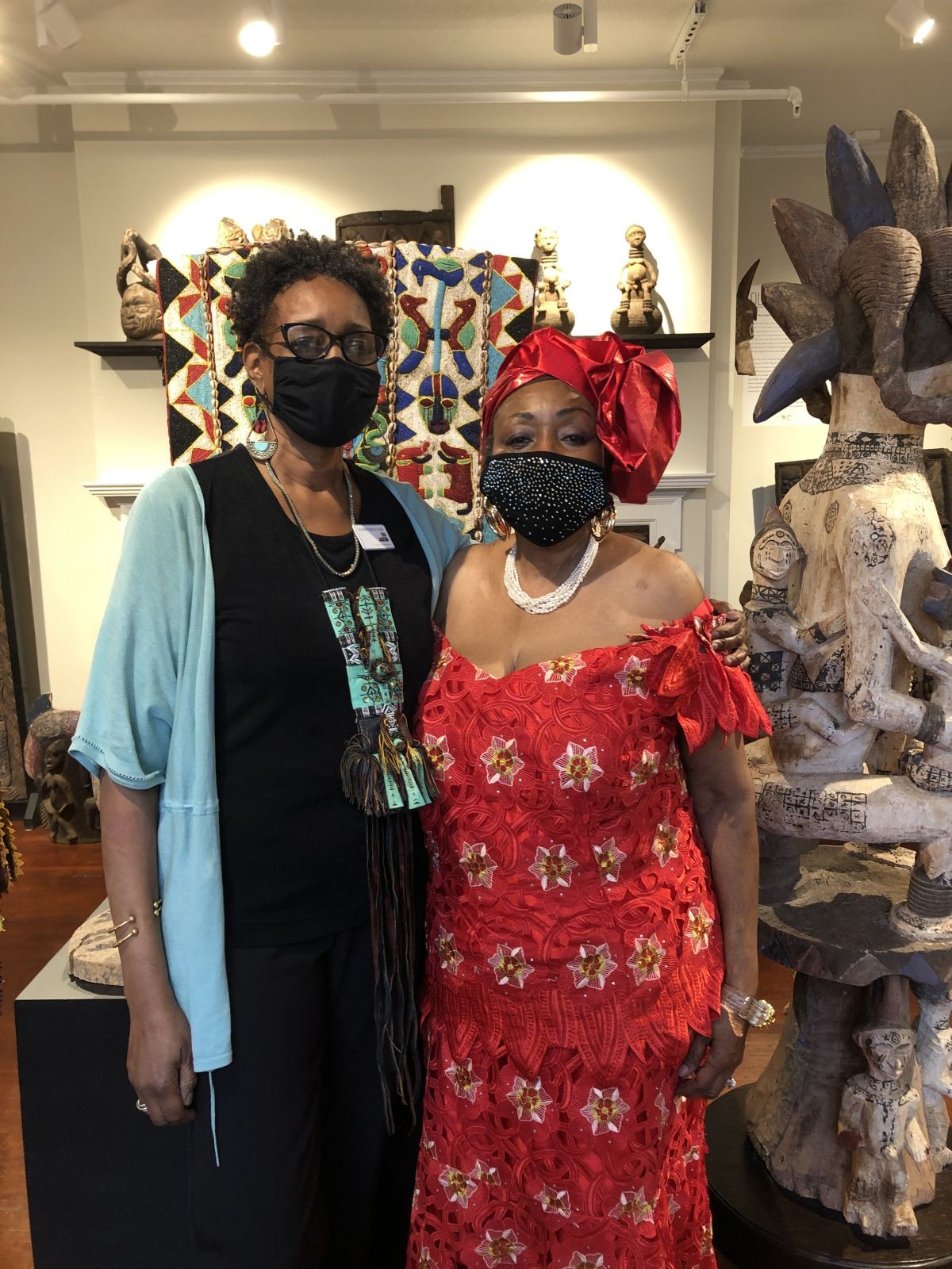 Lisa Jackson, left, and Mayor Edna Jackson gather in the Savannah African Art Museum.