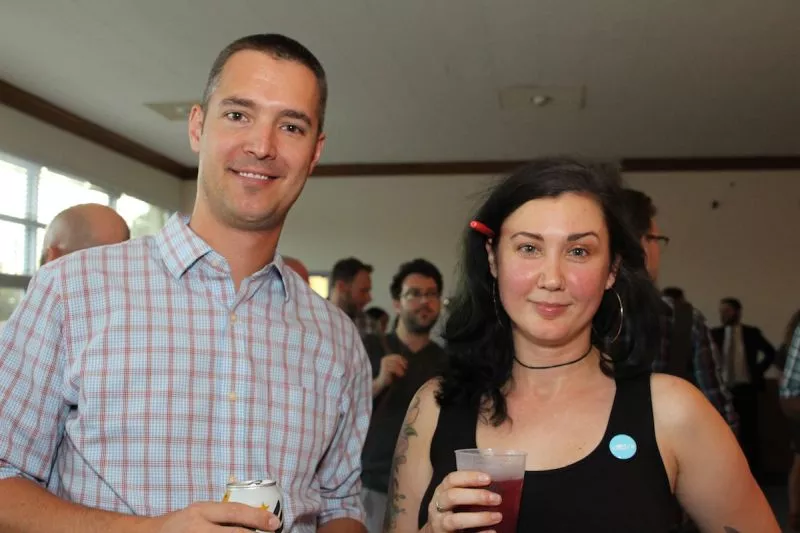 The Creative Coast’s Coco Papy (r) and Mark Lubbers of Gauge Interactive commune at the #MadeinSAV Kickoff Party. - PHOTO BY MAGGIE HARNEY