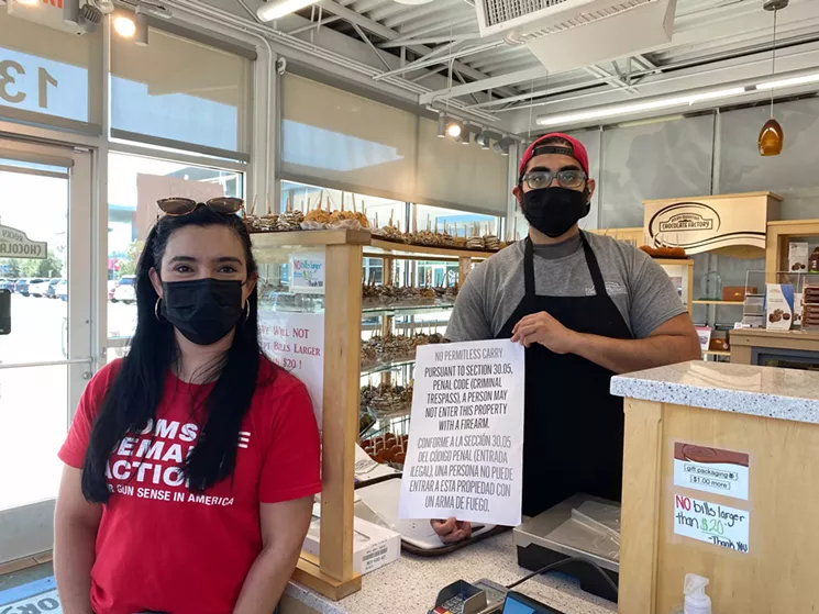 Moms Demand Action volunteers are equipping business owners with signs prohibiting firearms. - COURTESY MOMS DEMAND ACTION