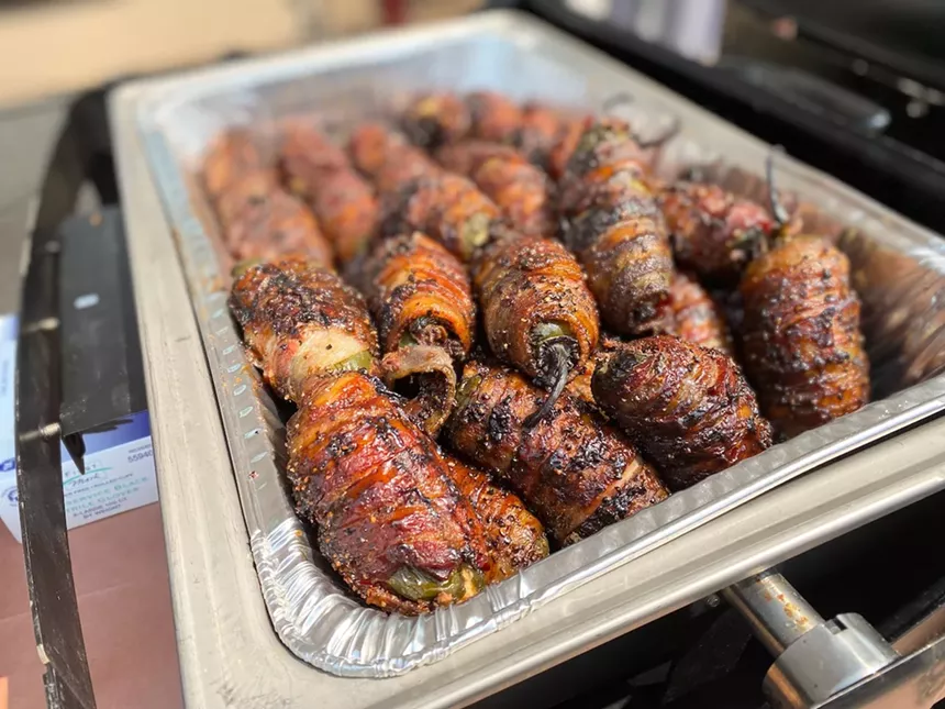 Jalapeños stuffed with brisket and cream cheese, wrapped in peppery bacon made for a fantastic snack at BrewFest this weekend. - LAUREN DREWES DANIELS