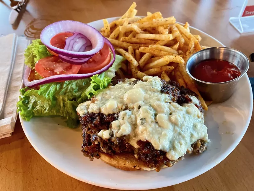 The Black and Bleu Burger is a half-pound patty topped with bacon jam and bleu cheese - LAUREN DREWES DANIELS/TWITTER