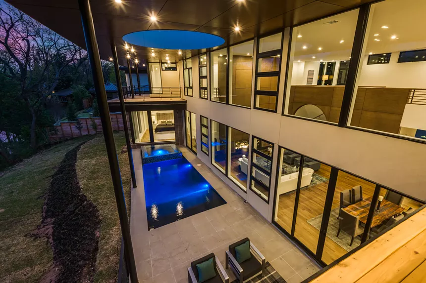 Strait Lane has a geometric pool area.  - SHOOT2SELL