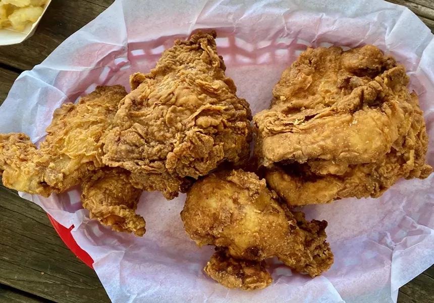 A half bird of bone-in chicken is juicier than the strips, as expected. But that crust is a story in itself. - LAUREN DREWES DANIELS