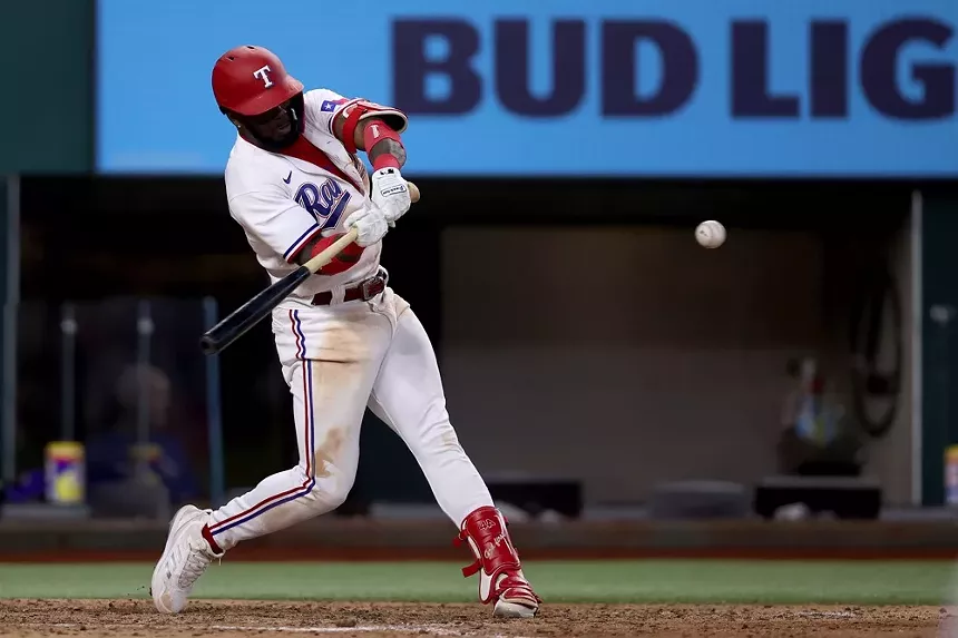 Adolis Garcia at bat against the Los Angeles Angels on Sept.30 in Arlington. - TOM PENNINGTON/GETTY IMAGES