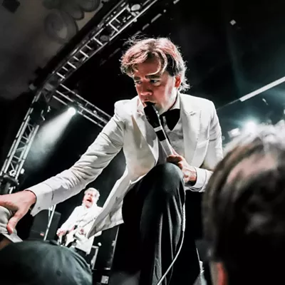 The Hives' singer Pelle Almqvist got up in fans' faces.