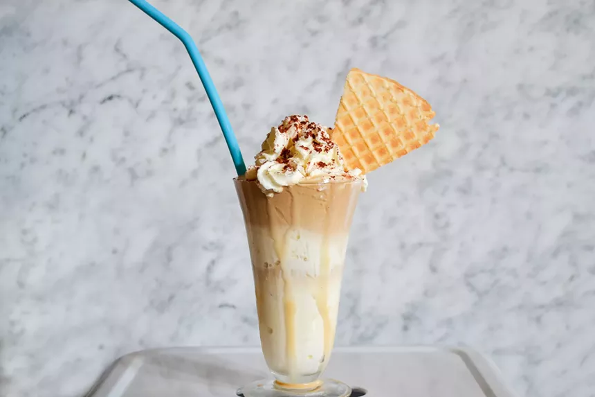 Eiskaffee specializes in cold-brew coffee topped with vanilla ice cream, grated chocolate and whipped cream. - EISKAFFEE
