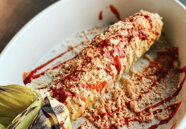 Elote, Mexican street corn made with mayonnaise and spices, is one dish on the menu at Linda Hermosa. - COURTESY OF FRANCISCO QUINTANA
