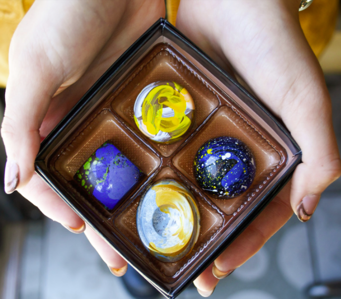 These painted candies are inspired by the works of Van Gogh. - TEMPERED CHOCOLATES & CONFECTIONS
