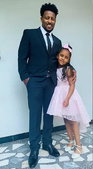 Wongel Estifanos posing with her father, Estifanos Dagne. - FAMILY PHOTO VIA DAN CAPLIS LAW