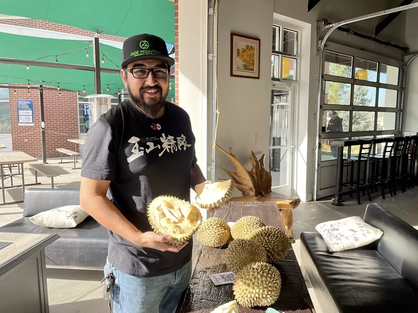 Sean Guerrero of Jade Mountain transforms durian fruit for a beer. - JONATHAN SHIKE