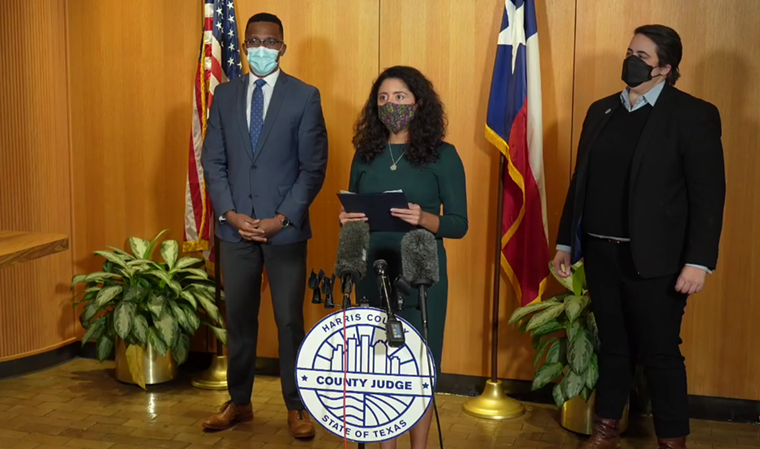 Lina Hidalgo, County Attorney Christian Menefee (left) and Election Administrator Isabel Longoria (right) blasted Abbott Friday. - SCREENSHOT