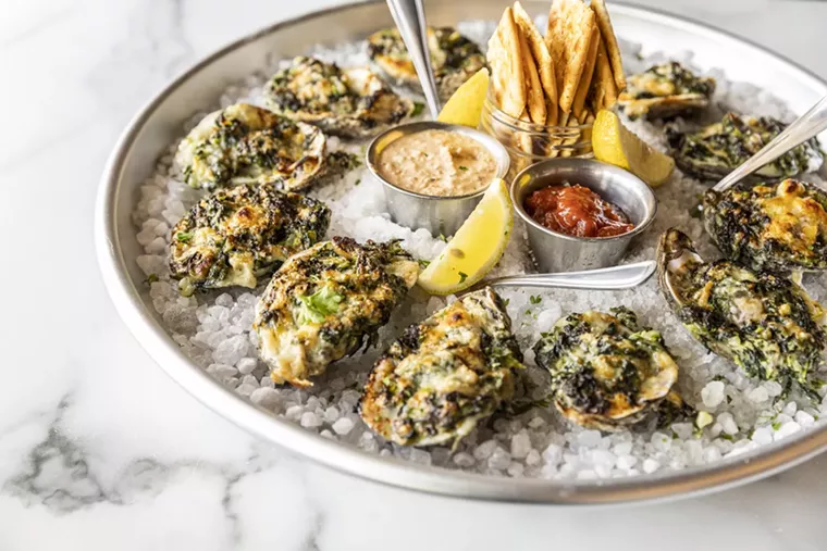 Indulge in the oyster program at Relish, which just hit its five year anniversary. - PHOTO BY JULIE SOEFER