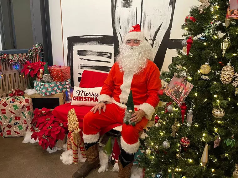 Santa is pitmaster Vince Boisaubin and he's ready to make your Christmas barbecue dreams come true. - PHOTO BY ERIN SMITH