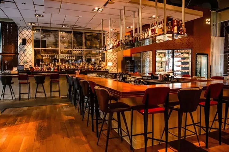 Head to the bar and order a martini with your best British accent. - PHOTO BY KRISTEN GILLIAM