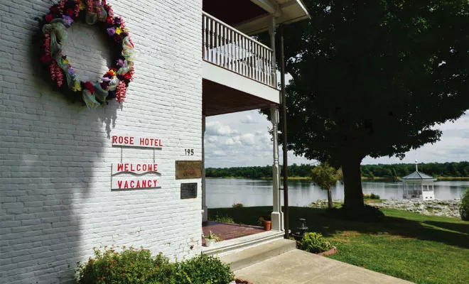 Visitors to Elizabethtown in far southeastern Illinois can watch the Ohio River roll by at the Rose Hotel, an inn built in 1812 and now owned by the state of Illinois. The hotel features five rooms and wide porches on both the first and second floors. - PHOTO BY BRENT BOHLEN