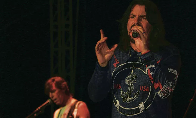 Lead singer Tommy DeCarlo, right, entertains the crowd while Boston founder Tom Scholz, left, sings backup. - PHOTO BY BRUCE RUSHTON