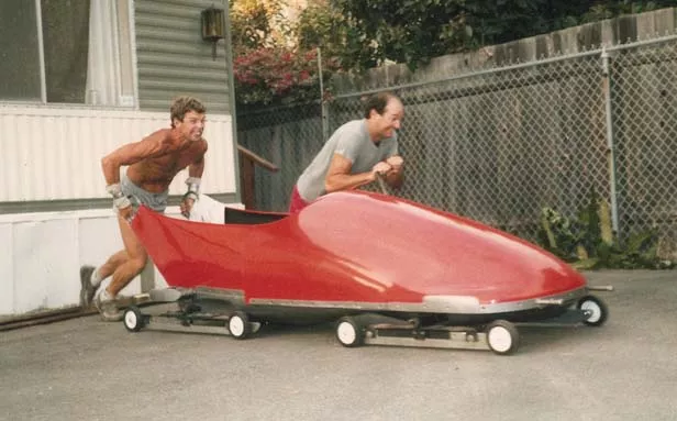 William Shea (left) and Brian Richardson practice launching “Calgary 88,” a two-man bobsled, during a 1986-1987 summer training session. - PHOTO COURTESY BILL SHEA