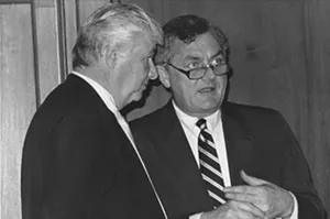 A 1989 photo of Sen. Phil Rock, right, and Senate Minority Leader James “Pate” Philip. The two discussed issues and votes nearly every day during Rock’s 12-year tenure as Senate president. - PHOTO BY GINNY LEE