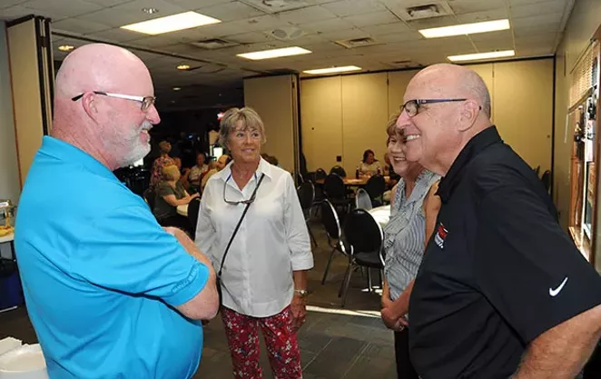 Mike Murphy, right, talks to Phil Gonet at an Aug. 21 campaign fundraiser in Springfield. - PHOTO BY DAVID BLANCHETTE