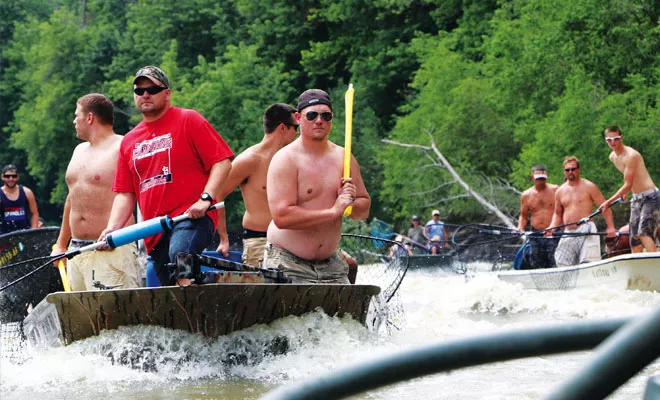 Rods and reels are banned, but nets, bats and ax handles are all good in the Redneck Fishing Tournament. - PHOTO BY BRUCE RUSHTON