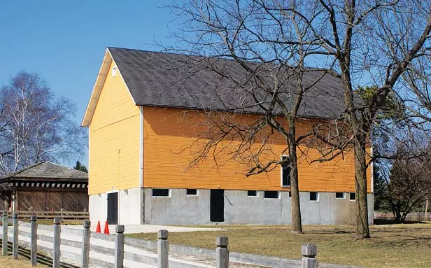 This barn and several structures from late 1800s farmsteads remain at the site where the McCormicks’ house once stood. - PHOTOS BY CINDY LADAGE
