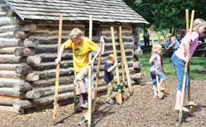 Walking on stilts is one of the fun family activities at Pioneer Pastimes in Nauvoo. - PHOTOS BY JOHN CAMPER