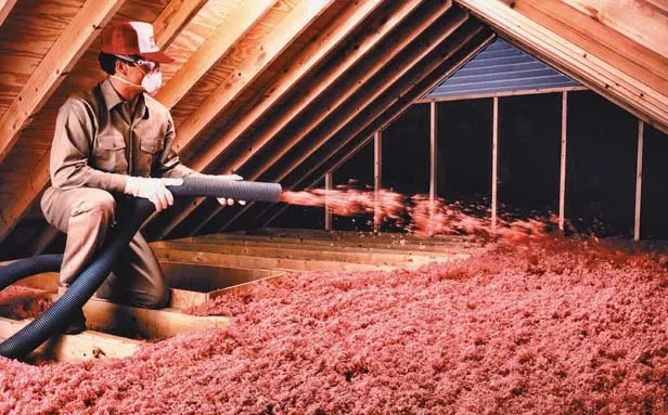 A foot-thick layer of insulation in the attic helps retain cool air in the house while serving as a barrier to heat from the roof.