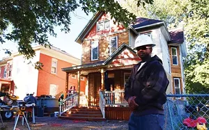 Calvin Pitts, a professional electrician and construction manager, purchased this home on North Fifth Street from Enos Park Development. He and his wife will live there once restoration is completed. - PHOTO BY DAVID HINE
