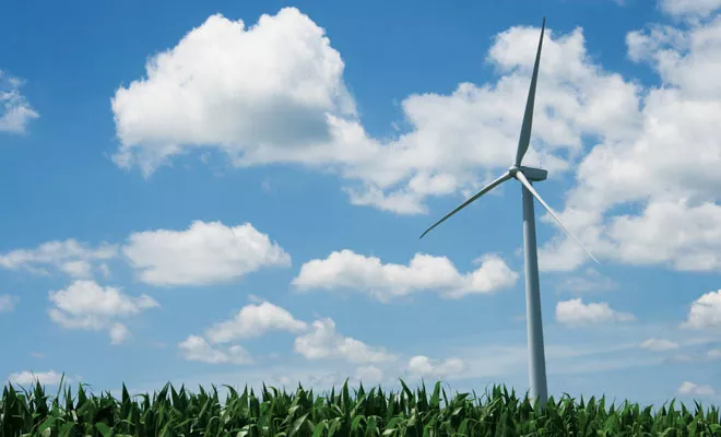 A wind turbine at the Rail Splitter Wind Farm north of Lincoln stands about 400 feet tall and generates about 1.5 megawatts of electricity - enough to power about 300 homes. - PHOTO BY PATRICK YEAGLE