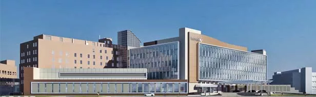 This rendering shows how Memorial Medical Center will look once the new surgical wing (the long, flat building) and patient tower (at right) are completed. They will overlook Miller Street. - COURTESY OF BSA LIFE STRUCTURES
