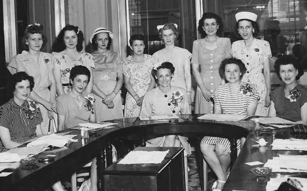 In this 1947 photo, Kappa Chapter members flanked visiting national officers seated in front. Standing, from left, are Jo Moody, Audrey Roesch, Lorene McMahonn, Midge Vancil, Pauline Bentley, Wilma Hofferkamp and Mary Roesch.