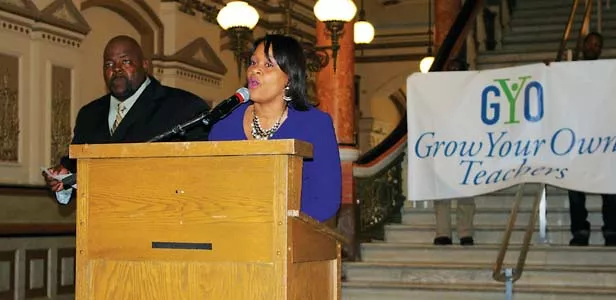 State Sen. Kim Lightford addresses a crowd of 200 members and supporters of Grow Your Own Teachers at a Feb. 23 rally at the Capitol. The state-funded program covers the cost of tuition, books and fees for nontraditional students in exchange for five year - PHOTO BY AMANDA ROBERT