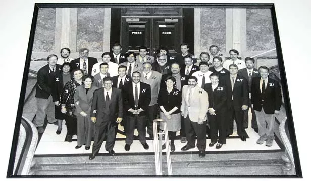 Statehouse reporters in 2000 gather outside the Capitol’s press room. - PHOTO BY RANDY SQUIRES COURTESY OF THE ILLINOIS LEGISLATIVE CORRESPONDENTS ASSOCIATION