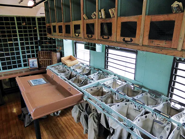 Visitors to the Galesburg Railroad Museum can walk through a restored mail car and learn how postal workers sorted mail for drop off as a train passed through towns. The museum also features an engine, a caboose, a Pullman car and thousands of railroad it - PHOTOS BY BRENT BOHLEN
