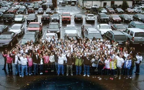 Some of the 280 volunteers gathered outside the United Way of Central Illinois headquarters at 1999 Wabash Ave. on Oct. 5 for a Day of Service. - PHOTO BY PATRICK YEAGLE