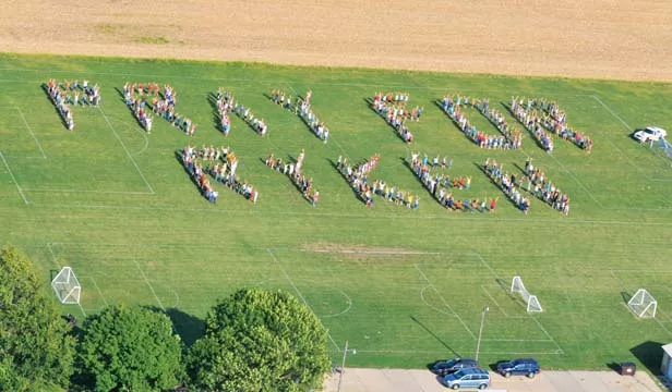 Organized by Jason Garrett, a friend of the Bailey family, more than 400 community members gathered for a “Pray for Ryken Flyover.” Garrett says the event was meant to show the Baileys just how much support the community had to giv - PHOTO BY JOHN HUGHES