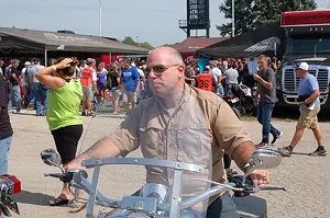 Sen. Sam McCann, pictured here at the recent Springfield Mile, has spent more than $60,000 for an SUV.